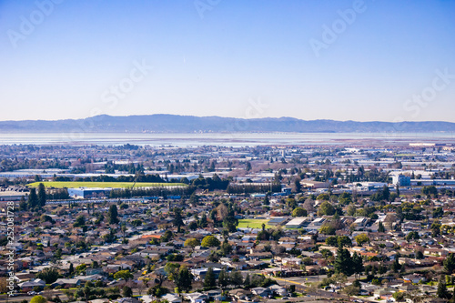 View towards the towns of east bay; San Mateo bridge on the background, San Francisco bay area, Hayward, California photo