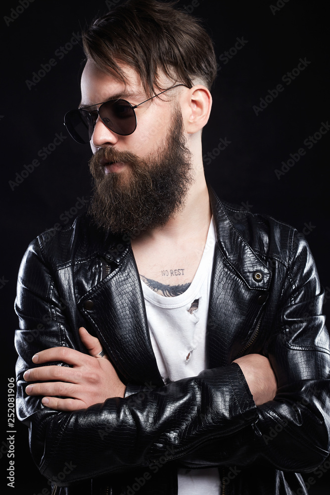 Obraz premium fashionable handsome man in sunglasses