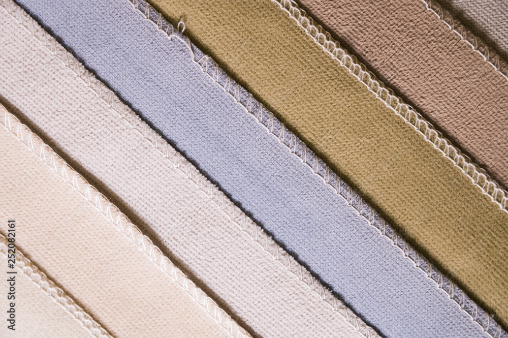 Fototapeta premium Abstract diagonal textile background multicolored stripes from factory upholstery textiles for furniture