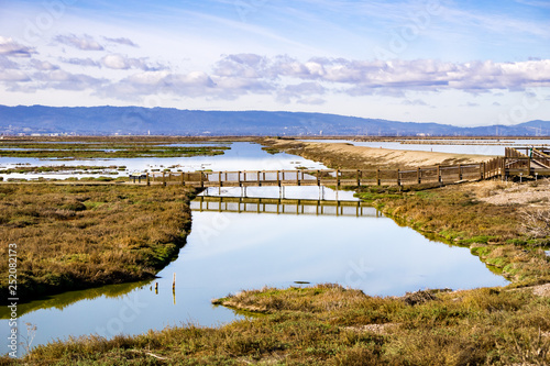 Bridge in Alviso Marsh, Don Edwards wildlife refuge, south San Francisco bay, San Jose, California photo