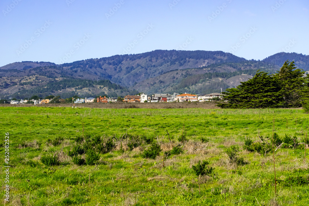 View towards the houses in Half Moon Bay on a clear day, California