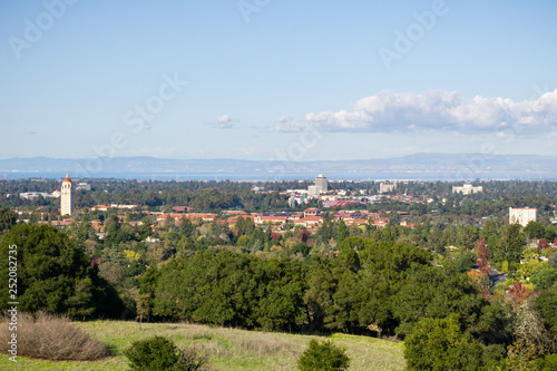 View towards Stanford Campus and Hoover tower from the Stanford dish hills, Palo Alto, San Francisco bay area, California photo