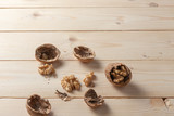 Walnuts on a wooden table.