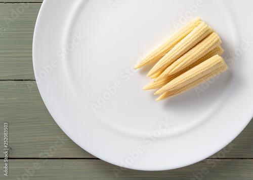 french fries on plate with fork and knife