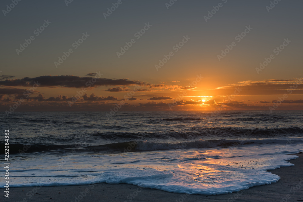 sunrise sunset over the sea