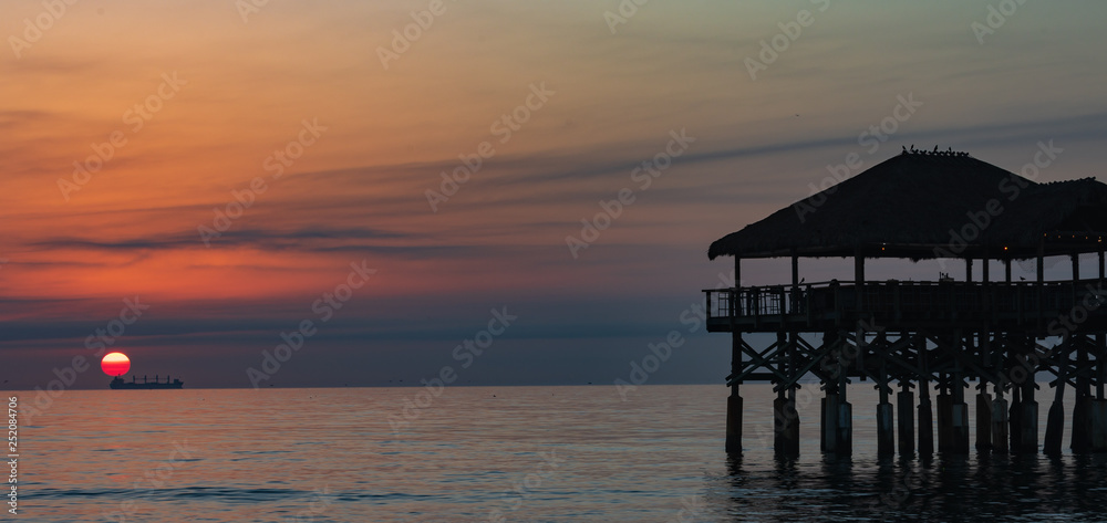 old wooden pier at sunset sunrise