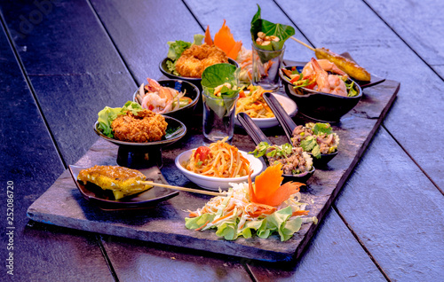 Mixed Traditional Thaifoods on a Stoneplate, Fining Dining, Thailand photo