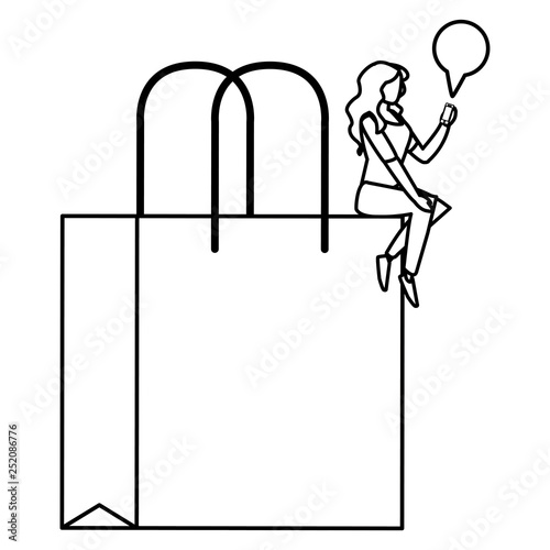 woman using smartphone with shopping bag