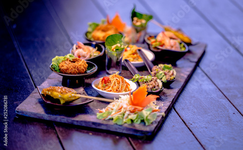 Mixed Traditional Thaifoods on a Stoneplate, Fining Dining, Thailand photo