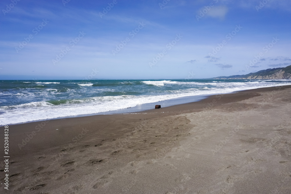 Sandy beach on the Pacific Ocean coastline, California