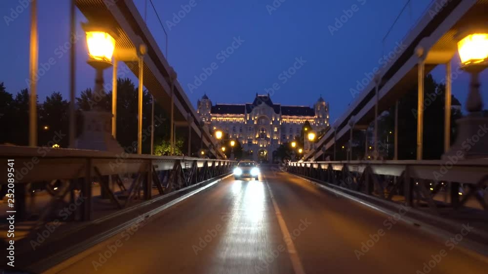Car Traffic Over Chain Bridge Budapest Hungary POV Point Of View Four Seasons Hotel Gresham Palace Night City Lights Car Traffic Over Chain Bridge Budapest Hungary POV Point Of View Four Seasons Hotel Gresham Palace Night City Lights