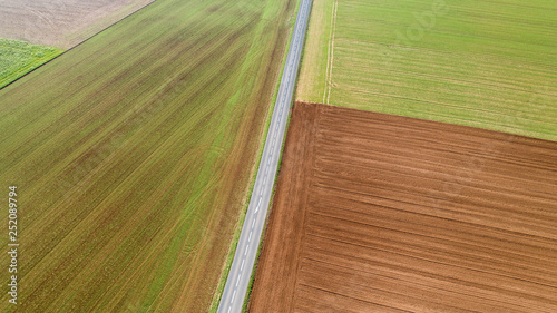 Aerial view of a road in the middle of the fields in Vendee