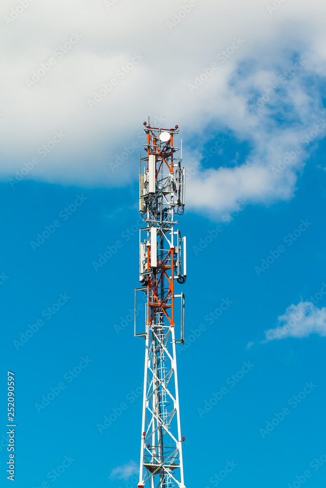 3G, 4G and 5G cellular. Base Station or Base Transceiver Station. Telecommunication tower. Wireless Communication Antenna Transmitter. Telecommunication tower with antennas against blue sky with