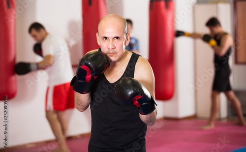 Professional boxer is practicing different kiks