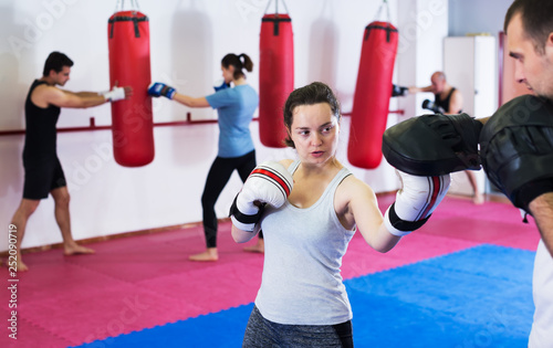 Girl sparring at box class