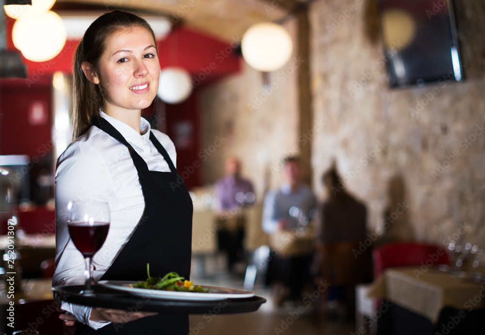 Waitress with serving tray