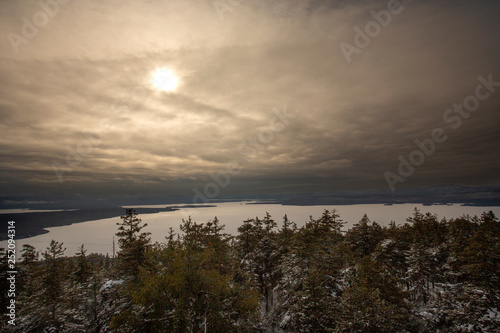 Sunset over a frozen Mooselookmeguntic Lake in Rangeley  Maine.