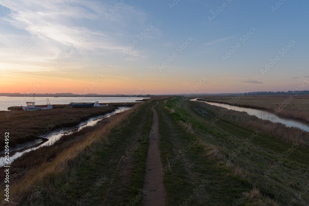 Beautiful sunset in Aldeburgh - looking inland, with the River Alde on the left Beautiful sunset in Aldeburgh - looking inland, with the River Alde on the left