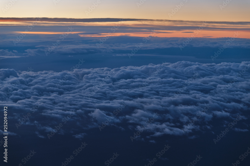 Beautiful Cloudscape Scene at Sunset from Airplane