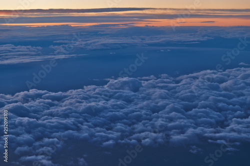Beautiful Cloudscape Scene at Sunset from Airplane