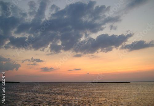 sea ​​horizon setting sun and clouds © Vadim