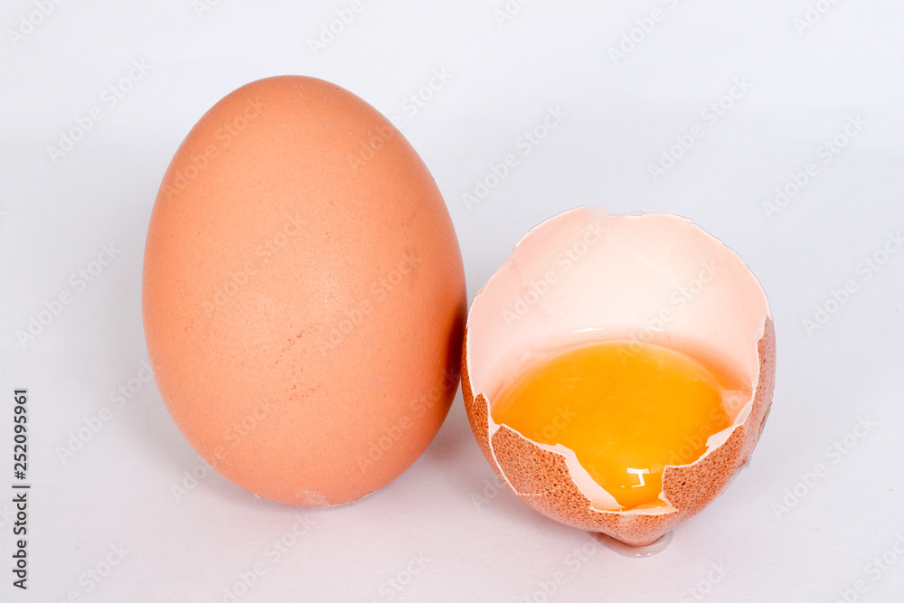 Raw brown chicken eggs on white background Raw brown chicken eggs on white background