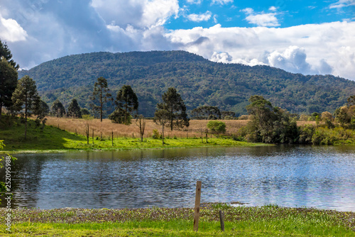 Perimbo dam lake, with many trees and lawn in the surroundings, Petrolandia, Santa Catarina, Brazil