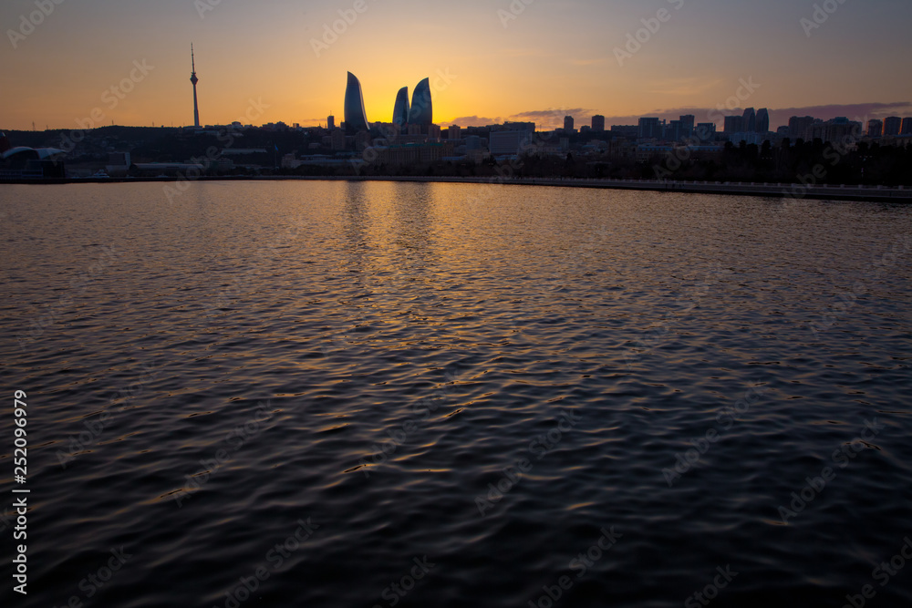 Sunset of Baku, Azerbaijan . Fire towers in the night