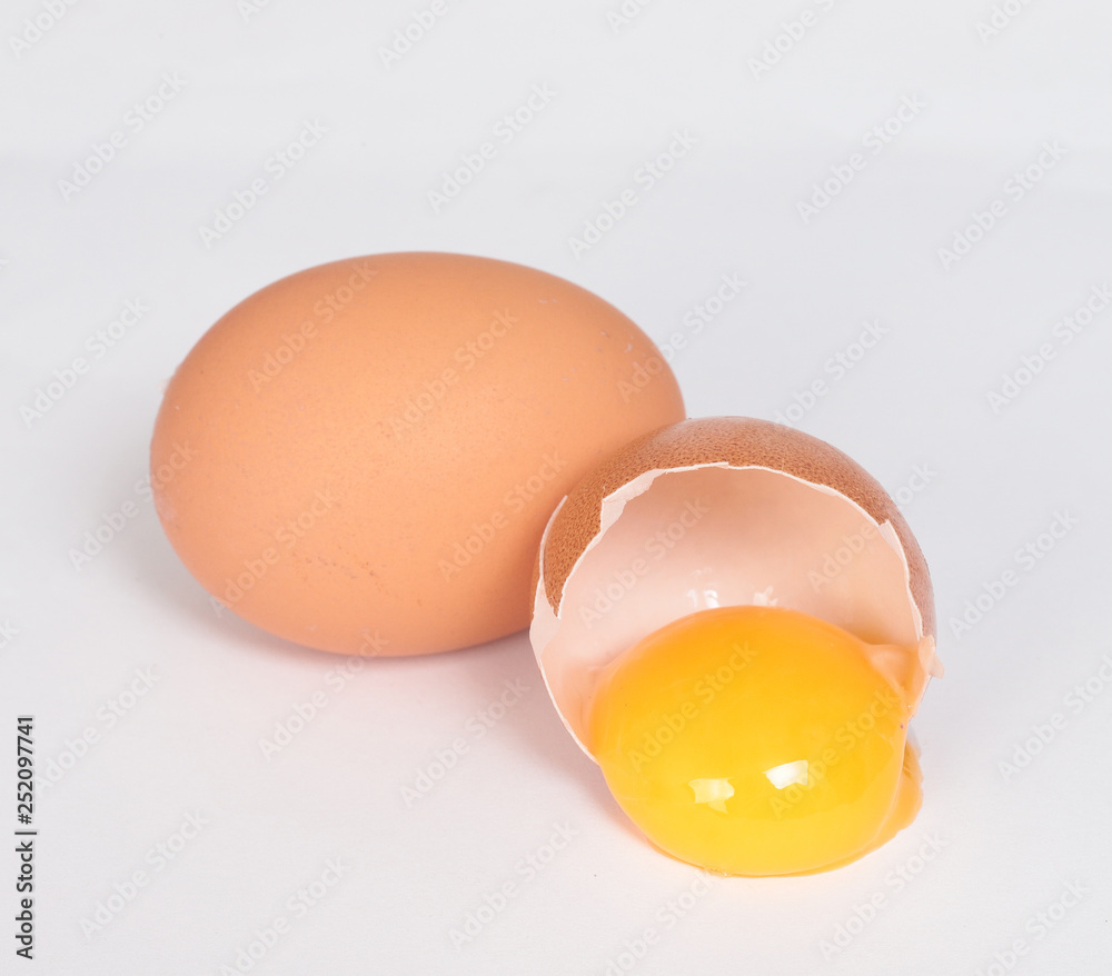 Raw brown chicken eggs on white background Raw brown chicken eggs on white background