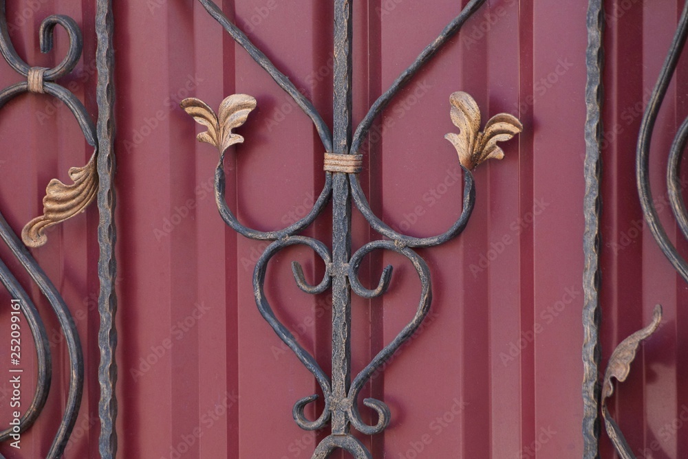 black red metal texture wrought pattern on the gate black red metal texture wrought pattern on the gate