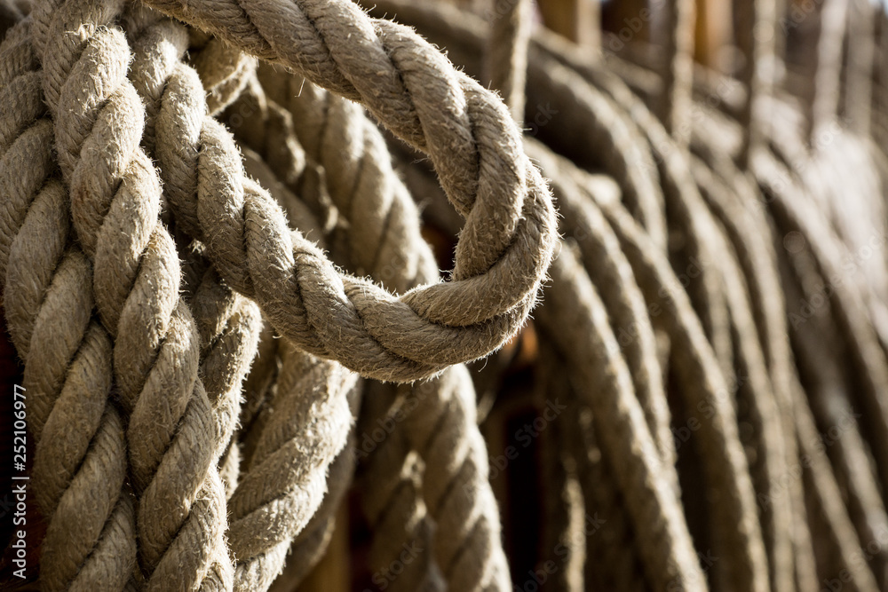 Hanging rope close up on an old ship