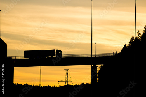 truck on a bridge silhouette
