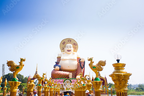 Smiling Buddha of wealth statue on Koh Samui  Thailand