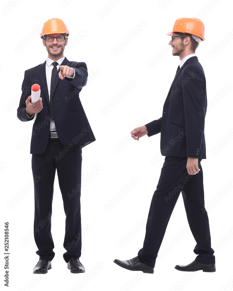 full-length .architect in orange helmet with drawings for new project. full-length .architect in orange helmet with drawings for new project.