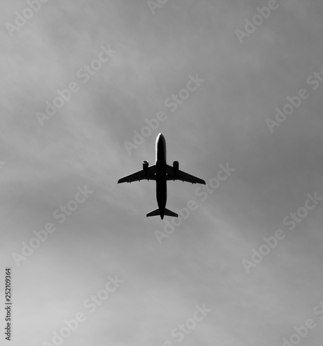Commercial aircraft is flying above