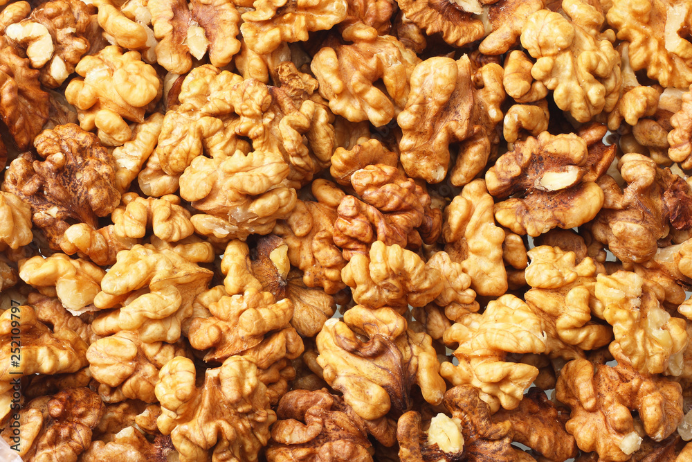 Walnuts background. Walnuts texture. top view. healthy food Walnuts background. Walnuts texture. top view. healthy food