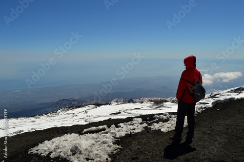 Winter mountain landscape with a man, Etna, Sicily, Italy
