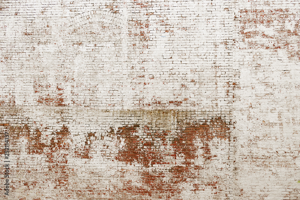 Old red brick wall with white paint background