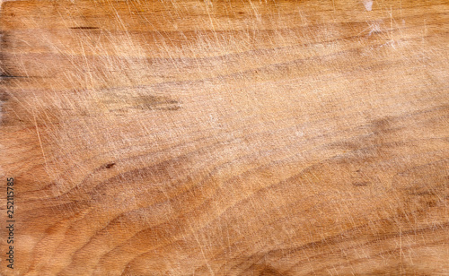 Used scratched wooden cutting surface, texture background.