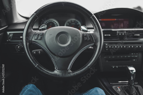 steering wheel, interior of a modern business car © velimir