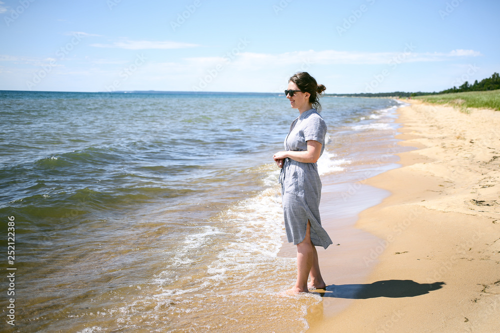 Young Hipster Woman Enjoying the Summer Ocean Breeze 02