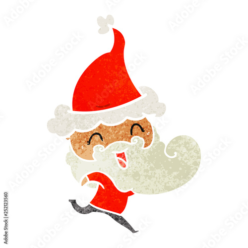 happy bearded man wearing santa hat