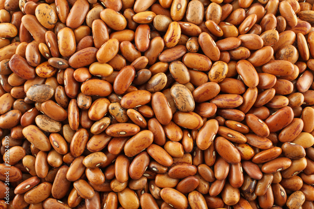 Food background - raw light brown kidney beans Food background - raw light brown kidney beans