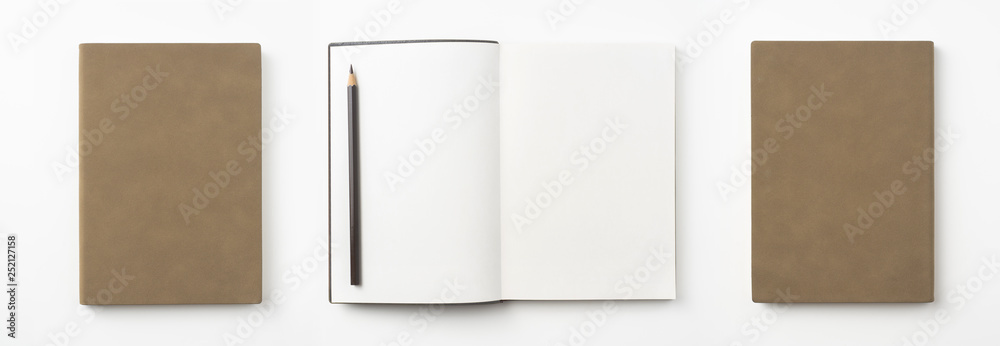brown notebook and pen on white background brown notebook and pen on white background