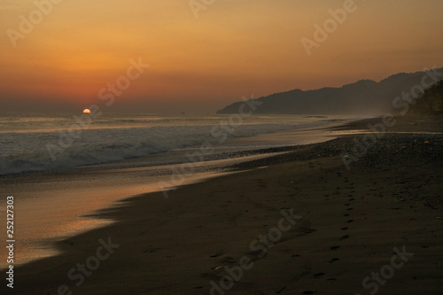 Fototapeta Naklejka Na Ścianę i Meble -  A Beautiful Sunset at a Sandy Beach