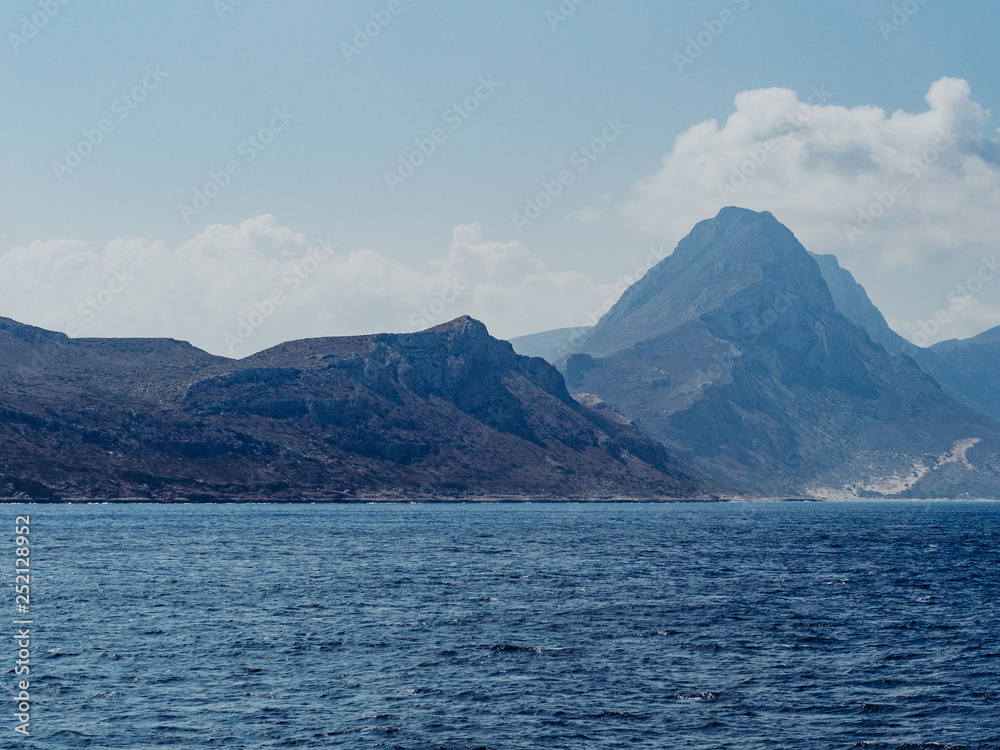 Dark and moody mountains of Crete - view from the sea