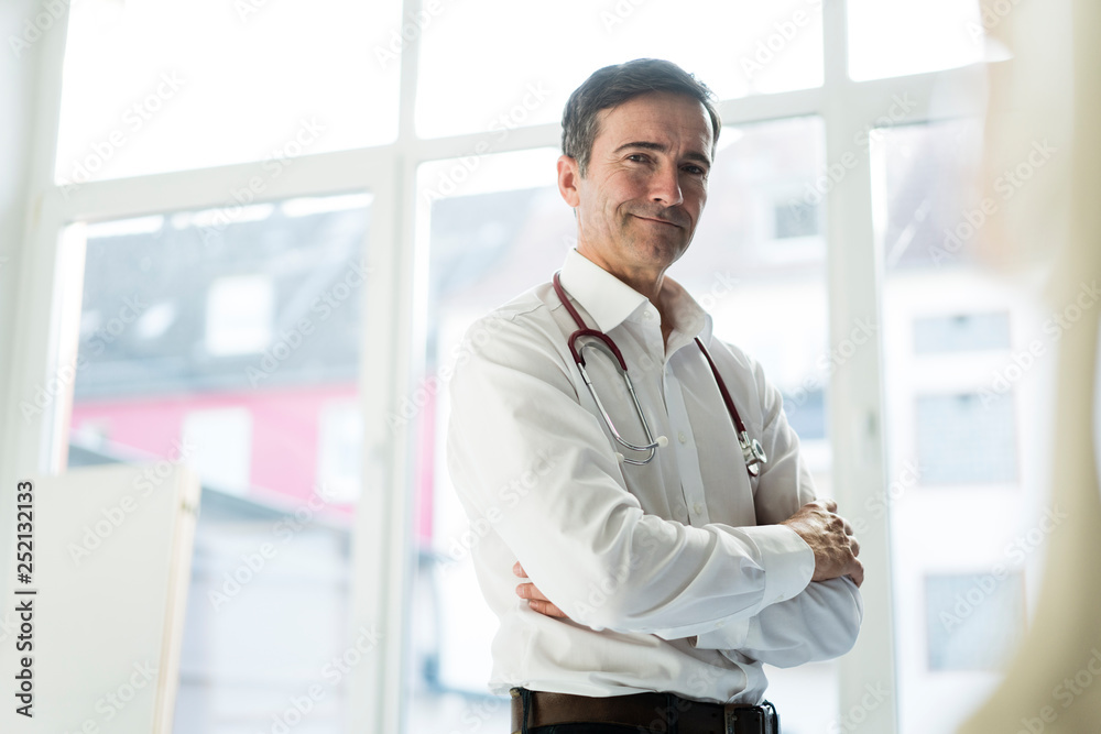 Portrait of confident doctor in medical practice Portrait of confident doctor in medical practice
