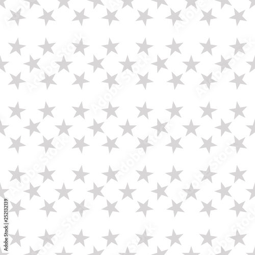 Seamless pattern with pastel gray hand drawn stars on white background. Sky background. Cute wrapping paper. Vector illustration.