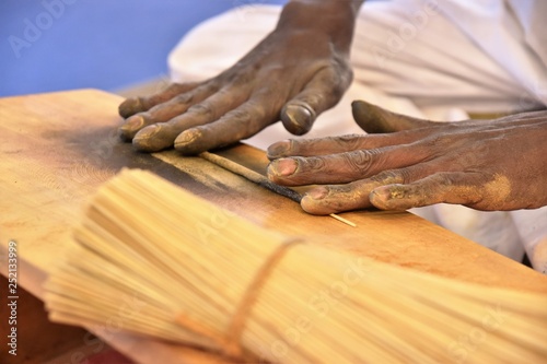 Rolling incense by hand