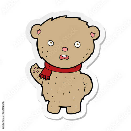 sticker of a cartoon teddy bear wearing scarf